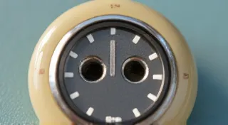 The Significance of Button Back Marks: Identifying Manufacturers and Dates